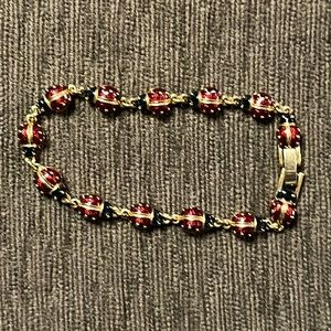 Premier Designs Signed Gold tone Ladybug Brooch with black and red enamel